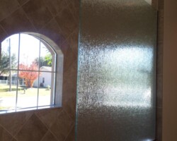 3/8” tempered rain glass with brushed nickel channel