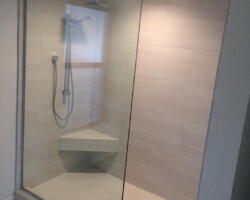 3/8” clear tempered glass with chrome channel