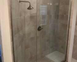 3/8” clear tempered glass, neo angle with brushed nickel channel and hardware