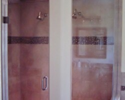 3/8” clear tempered glass, neo angle with brushed nickel channel (door is frameless with bore thru c pull handle)