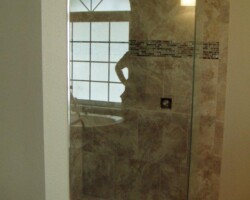 3/8” clear tempered glass, neo angle with brushed nickel channel and hardware