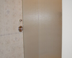 3/8” tempered rain glass with 90 degree angle and chrome channel