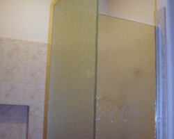 3/8” tempered rain glass with 90 degree angle and chrome channel
