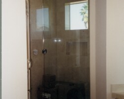 3/8” clear tempered glass with clipped corner