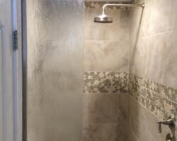 3/8” tempered bubbles glass with brushed nickel channel