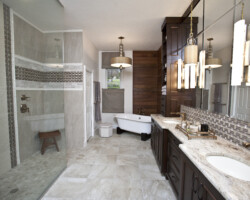 1/2” clear tempered glass with brushed nickel channel