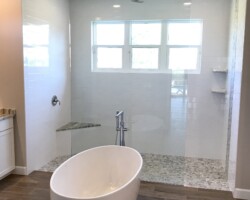 1/2” clear glass fixed panel with chrome bottom u channel and top clamps
