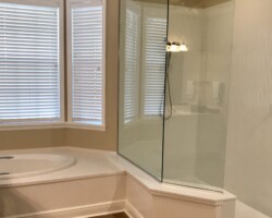 3/8” clear fixed panels with chrome u channel and slip over clip