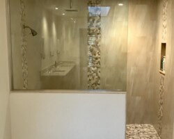 3/8” clear fixed panel glass with brushed nickel u channel