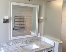 3/8” frosted fixed panel glass with chrome channel on 2 sides