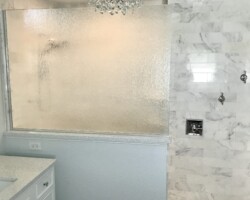 3/8” vertical rain glass with chrome channel on 2 sides